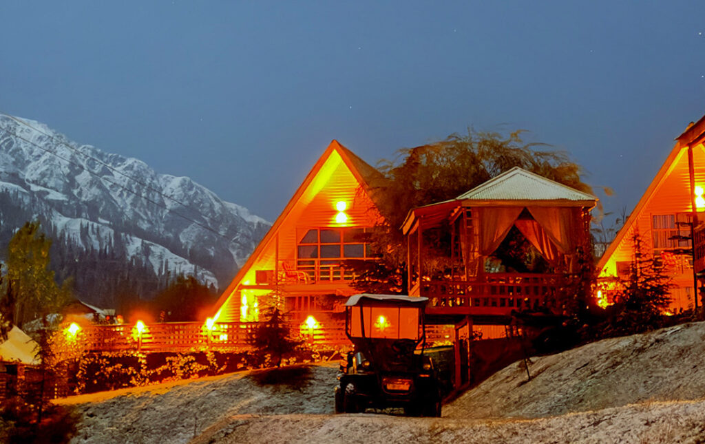 Cedarwood Resort overlooking snowy mountains in Shogran.